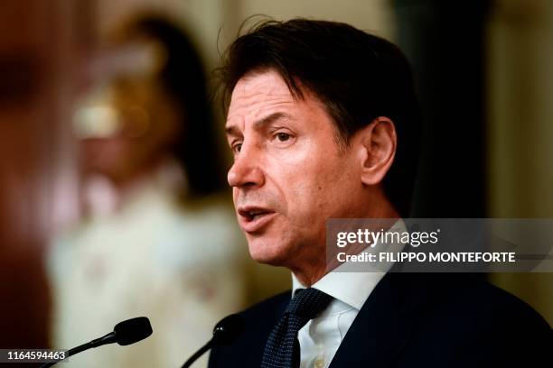 Italys Prime Minister Giuseppe Conte addresses the media following a meeting with the Italian president, after he was given a mandate to form a new...