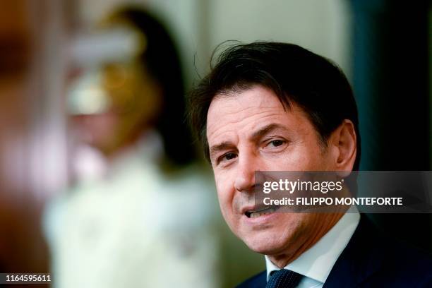 Italys Prime Minister Giuseppe Conte addresses the media following a meeting with the Italian president, after he was given a mandate to form a new...