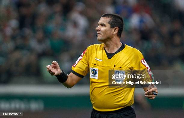 Referee Ricardo Marques Ribeiro gestures during a match between Palmeiras and Vasco for the Brasileirao Series A 2019 at Allianz Parque on July 27,...