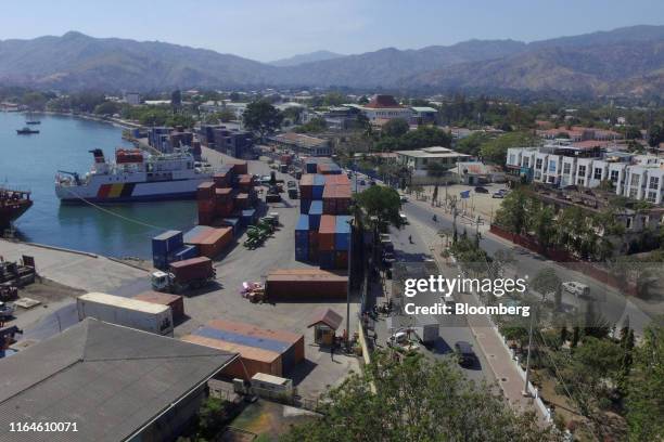 Container ship is docked at a container terminal in this aerial photograph taken in Dili, Timor-Leste, on Monday, Aug. 26, 2019. Twenty years on from...