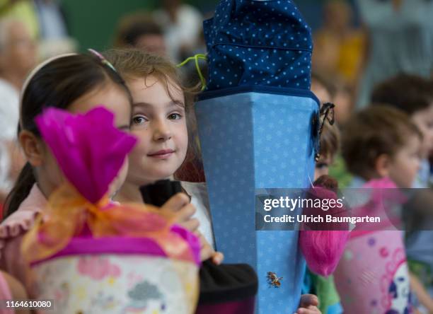 The first day of school in the Donatus elementary school in Bonn and a new step into life - girl with school cone.