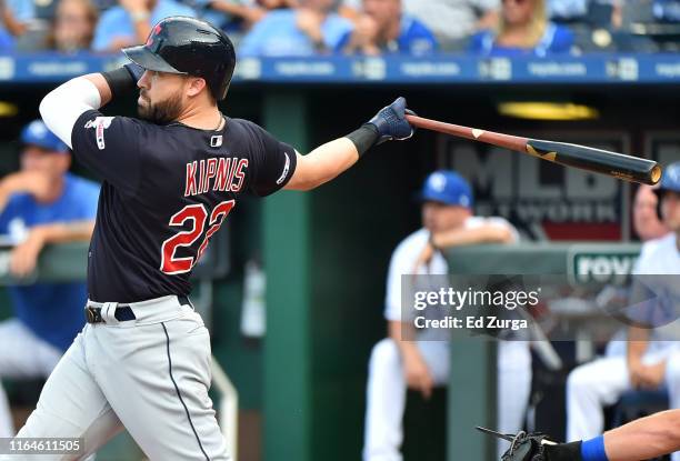 Jason Kipnis of the Cleveland Indians hits a grand slam in the first inning against the Kansas City Royals at Kauffman Stadium on July 27, 2019 in...