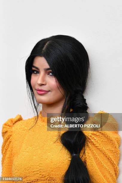 Saudi actress Mila Al Zahrani attends a photocall on August 29, 2019 for the film "The Perfect Candidate" during the 76th Venice Film Festival at...