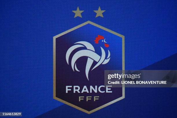 Picture taken on August 29, 2019 shows the logo of the French Football Federation with the two stars standing for twice World Cup winner, during a...