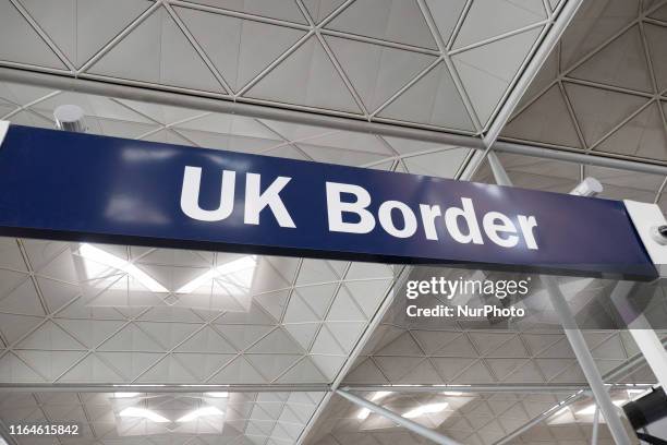 Borders, Passport and European Union signs and inscription in London Stansted STN airport in England, UK on 23 August 2019 a few months before the...