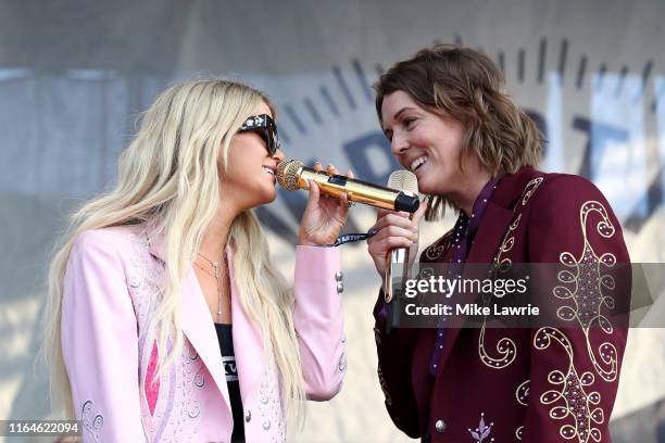 Maren Morris and Brandi Carlile perform as part of the Collaboration during day two of the 2019 Newport Folk Festival at Fort Adams State Park on...