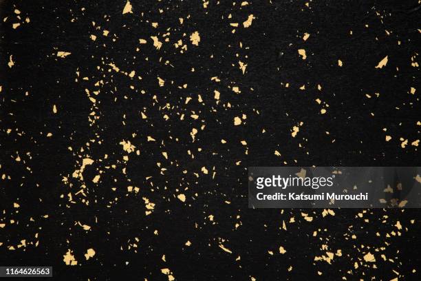 gold foil paper texture background - gold black background stock pictures, royalty-free photos & images