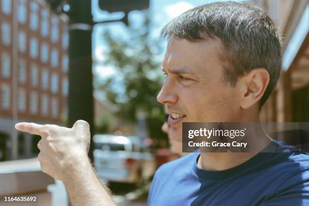 Point Hand Guy 47 Hand Pointing At Man Standing In Street Stock Photos, High-Res ...