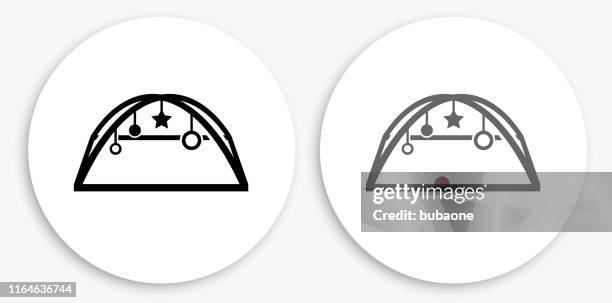 nursery mat black and white round icon - play mat stock illustrations
