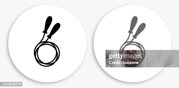 jump rope black and white round icon - jump rope stock illustrations