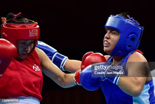 Brianda Cruz of Mexico fights against Keyling Osejo of Nicaragua during the Women's Welter Quarterfinals of Lima 2019 Pan Am Games at Miguel Grau...