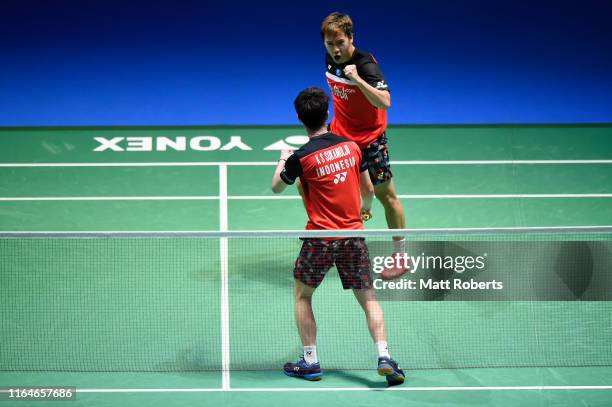 Marcus Fernaldi Gideon and Kevin Sanjaya Sukamuljo of Indonesia celebrate in the Men's Doubles Final match against Mohammad Ahsan and Hendra Setiawan...