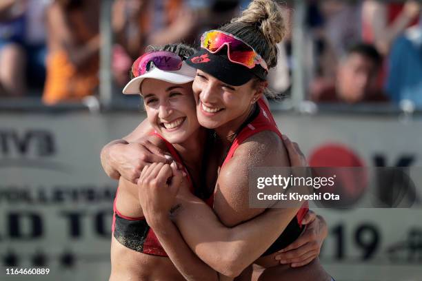 Heather Bansley and Brandie Wilkerson of Canada celebrate after winning the Women’s bronze medal match against Julia Sude and Karla Borger of Germany...