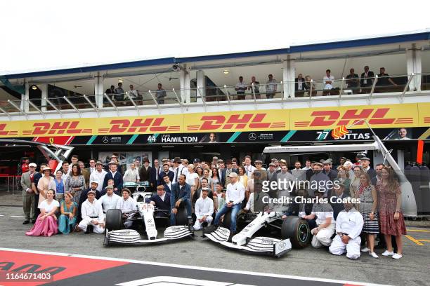 Lewis Hamilton of Great Britain and Mercedes GP, Mercedes GP Executive Director Toto Wolff, Valtteri Bottas of Finland and Mercedes GP and the...