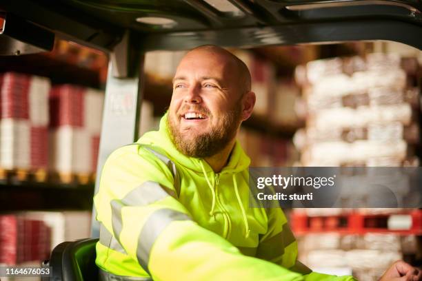 gelukkig warehouse driver - happy laugh stockfoto's en -beelden