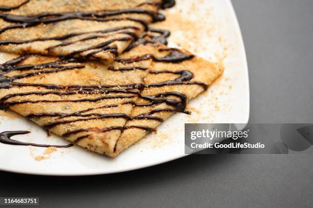 chocolate crepes - nutella pancake stock pictures, royalty-free photos & images