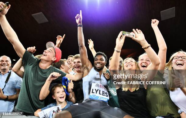 Noah Lyles celebrates with fans after winning in the Men 100m during the IAAF Diamond League competition on August 29 in Zurich.