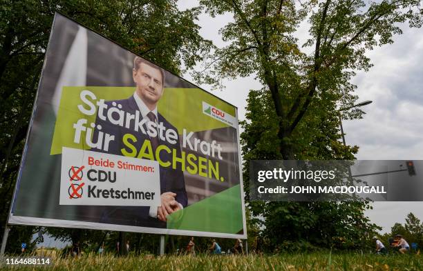 An election campaign billboard for the Christian Democratic Union featuring current Saxony Premier Michael Kretschmer and reading: "the strongest...