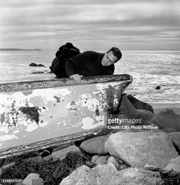Raymond Burr relaxes on his property, at home, where he lives as a bachelor. He stars in the CBS television legal drama series, Perry Mason. The home...