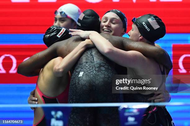 Simone Manuel, Regan Smith, Lilly King and Kelsi Dahlia of the United States celebrate winning the gold medal in the Women's 4x100m Medley Relay...