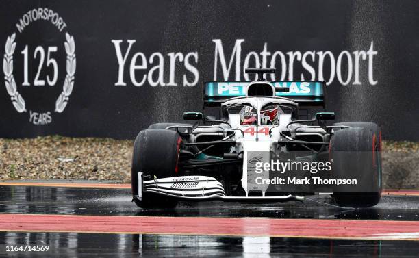 Lewis Hamilton of Great Britain driving the Mercedes AMG Petronas F1 Team Mercedes W10 with a broken front wing after crashing during the F1 Grand...