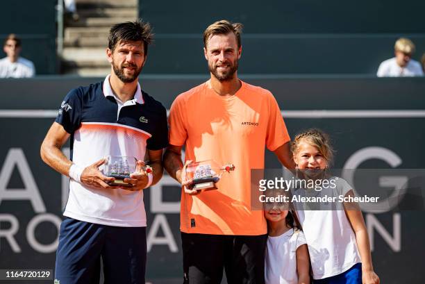 Oliver Marach and Juergen Melzer of Austria celebrate winning the double final during the Hamburg Open 2019 at Rothenbaum on July 28, 2019 in...