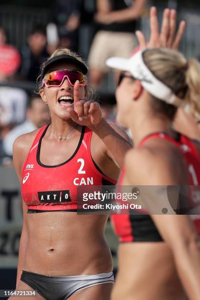 Brandie Wilkerson and Heather Bansley of Canada react in the Women’s bronze medal match against Karla Borger and Julia Sude of Germany on day five of...