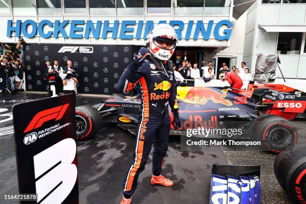 Race winner Max Verstappen of Netherlands and Red Bull Racing celebrates in parc ferme during the F1 Grand Prix of Germany at Hockenheimring on July...