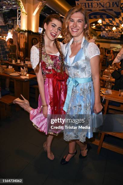 Tatjana Wiedemann and Klaudia Giez attend the Angermaier Trachtennacht at Hofbraeu Wirtshaus on August 29, 2019 in Berlin, Germany.