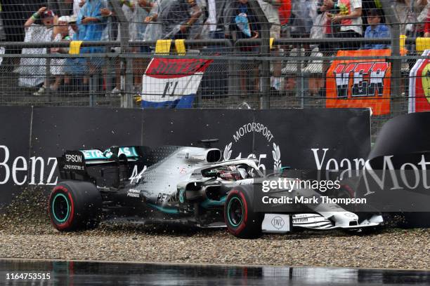 Lewis Hamilton of Great Britain driving the Mercedes AMG Petronas F1 Team Mercedes W10 crashes during the F1 Grand Prix of Germany at Hockenheimring...