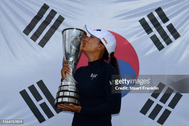 Jin Young Ko of South Korea celebrates with the trophy following victory in the Evian Championship at Evian Resort Golf Club on July 28, 2019 in...