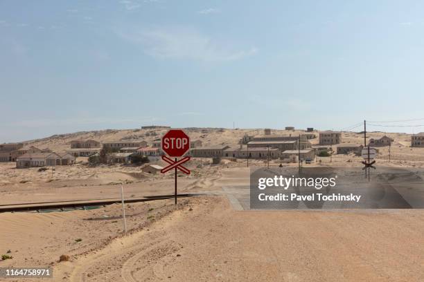 the road to kolmanskop - remote, former diamond-mining town near luderitz in southwestern namibia - kolmanskop namibia stock pictures, royalty-free photos & images
