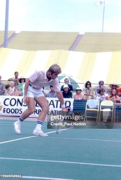 American tennis player Roscoe Tanner hits a backhand at a tennis tournament held at Soldier Field in Chicago, Illinois, 1976.