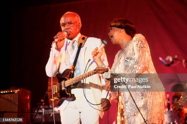 American Soul and Gospel musician Roebuck 'Pops' Staples and Mavis Staples, of the Staples Singers, as they perform onstage at the Petrillo...