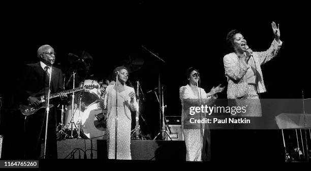 American Soul and Gospel group the Staples Singers perform onstage during a 'Loop Alive' concert at the Chicago Theater, Chicago Illinois, February...