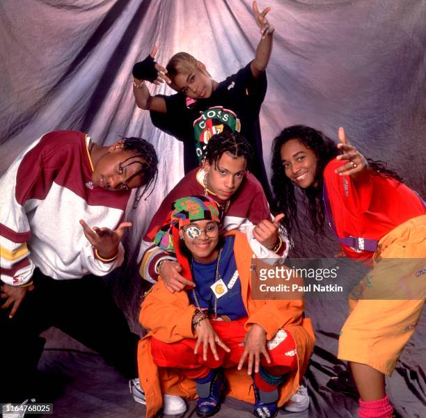 Portrait of members of American Hip Hop and R&B group Kriss Kross and TLC pose backstage during an appearance on an episode of the Oprah Winfrey...
