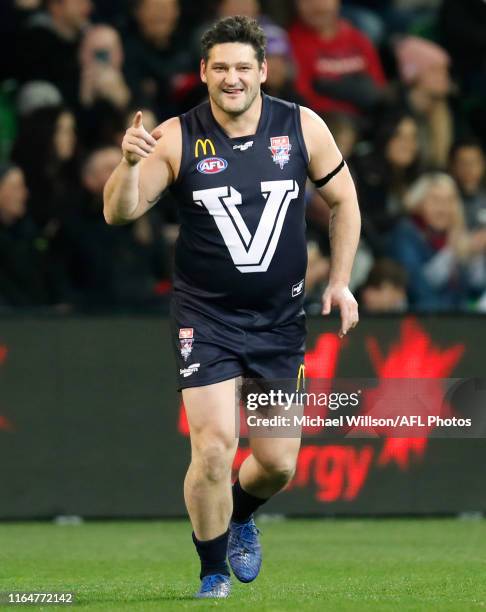 Brendan Fevola of Victoria celebrates during the 2019 EJ Whitten Legends Game between Victoria and the All Stars at AAMI Park on August 30, 2019 in...