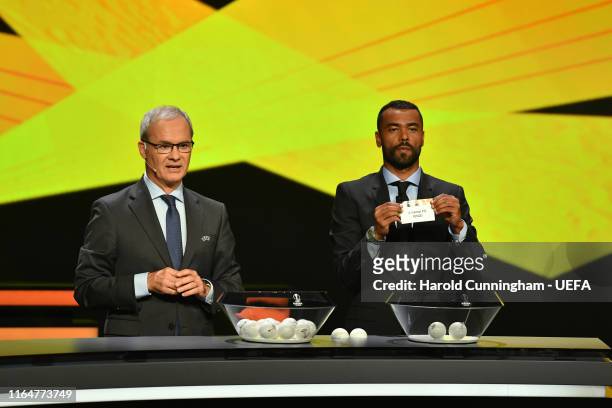 Ashley Cole draws the name of Arsenal during the UEFA Europa League 2019/20 Group Stage Draw, part of the UEFA European Club Football Season Kick-Off...