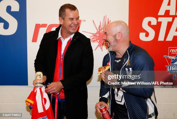 Wayne Carey, Coach of the All Stars and Daniel Harford of Victoria chat after the 2019 EJ Whitten Legends Game between Victoria and the All Stars at...