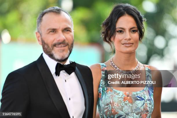 Italian actor Massimiliano Gallo and his companion Brazilian actress Shalana Santana arrive for the screening of the film "Il Sindaco del Rione...
