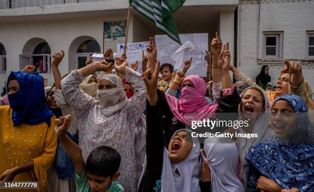 Kashmir Muslim women protesters shout anti Indian slogans during a protest against Indian rule and the revocation of Kashmir's special status, on...