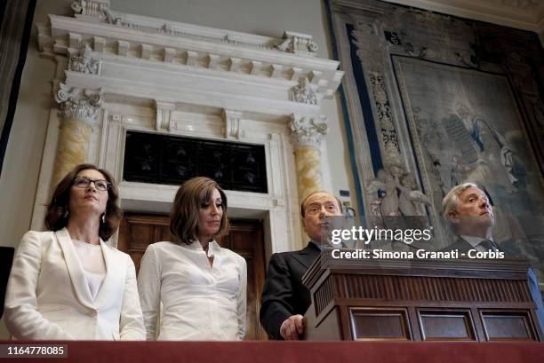 Silvio Berlusconi with Mariastella Gelmini, Anna Maria Bernini and Antonio Tajani , of Forza Italia party, speaks to the press at the end of the...