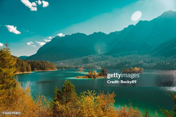 beautiful lake eibsee in garmisch-partenkirchen, germany - turquoise stock-fotos und bilder