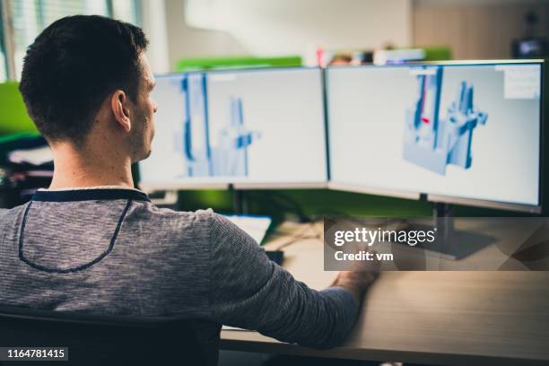 engineer making a 3d model on a computer - cad drawing stock pictures, royalty-free photos & images