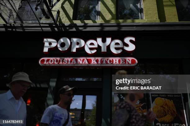 Popeyes fast food chain restaurant is seen on August 30, 2019 on a street of Washington D.C. - Chick it out! US restaurant chain Popeyes launched a...