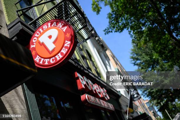 Popeyes fast food chain restaurant is seen on August 30, 2019 on a street of Washington D.C. - Chick it out! US restaurant chain Popeyes launched a...