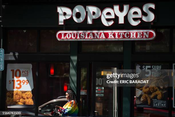 Popeyes fast food chain restaurant is seen on August 30, 2019 on a street of Washington D.C. - Chick it out! US restaurant chain Popeyes launched a...