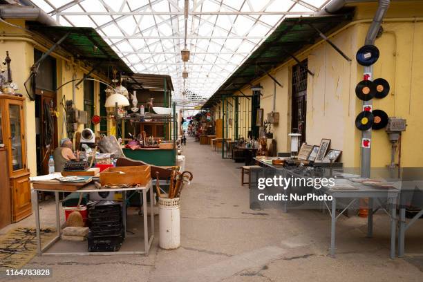 Ecseri Flea Market, located on the outskirts of Budapest, a flea market with lots of objects: Soviet-era objects, old coins, military items, one of...