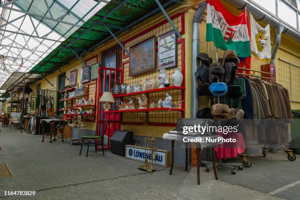 Ecseri Flea Market, located on the outskirts of Budapest, a flea market with lots of objects: Soviet-era objects, old coins, military items, one of...