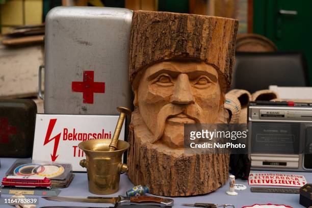 Ecseri Flea Market, located on the outskirts of Budapest, a flea market with lots of objects: Soviet-era objects, old coins, military items, one of...